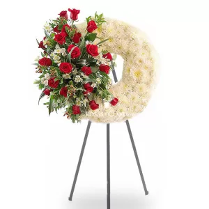 Corona de pompones, rosas y astromelias